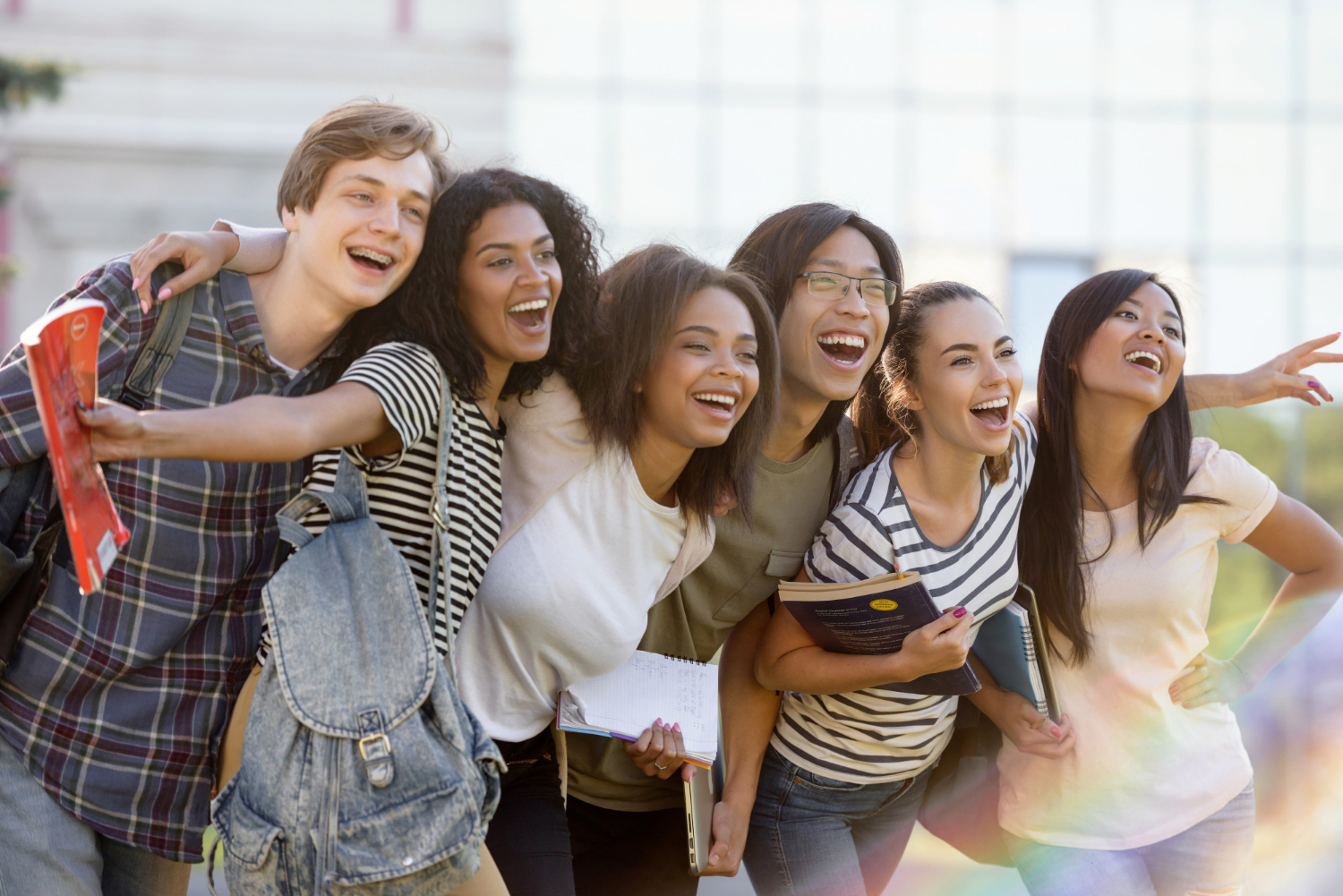 multiethnic-group-young-happy-students-standing-outdoors